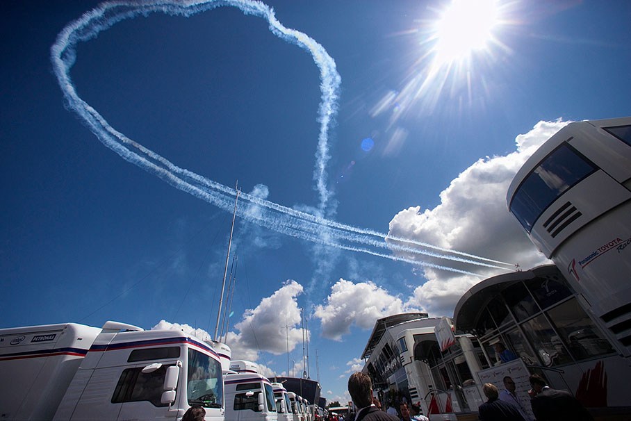 Air display show in blue skies above paddock