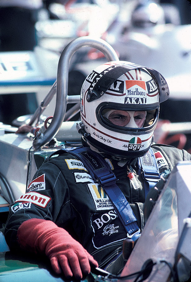 1980 Formula One World Champion Alan Jones in the cockpit of a Williams-Cosworth during a practice session before the Austrian GP 1981