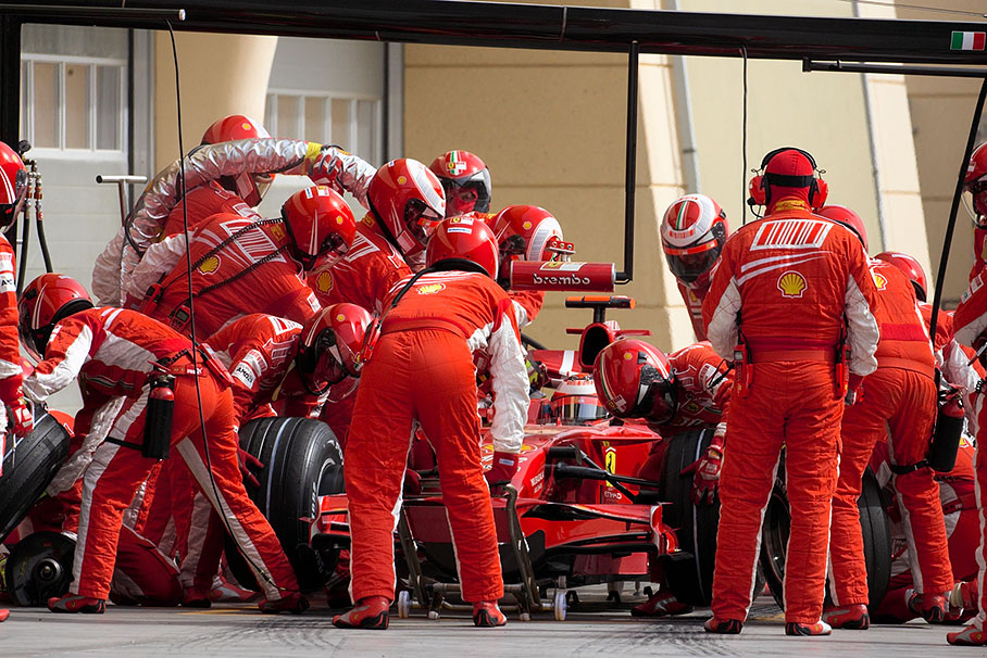 Raikkonen at Ferrari pits in lap 20