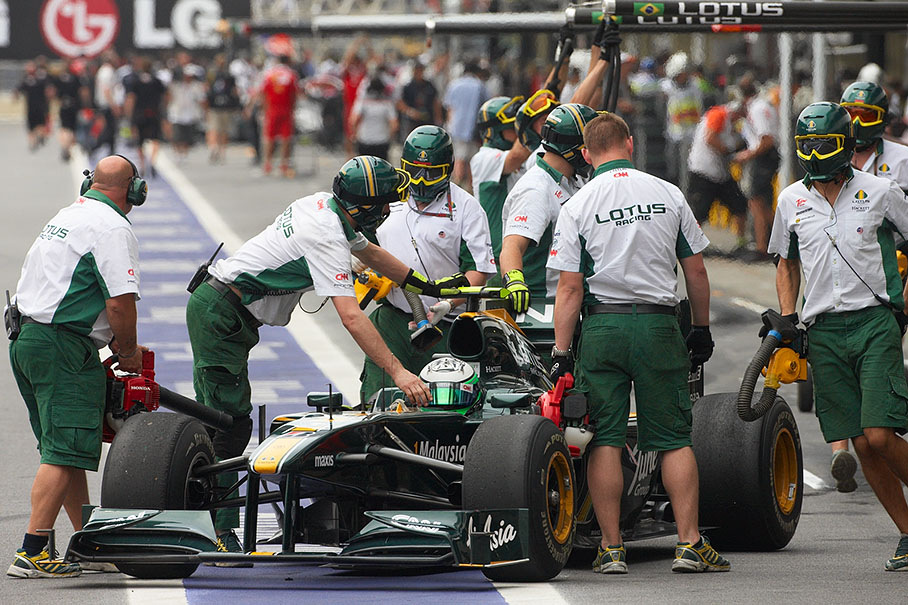 Heikki Kovalainen in Lotus Racing pits