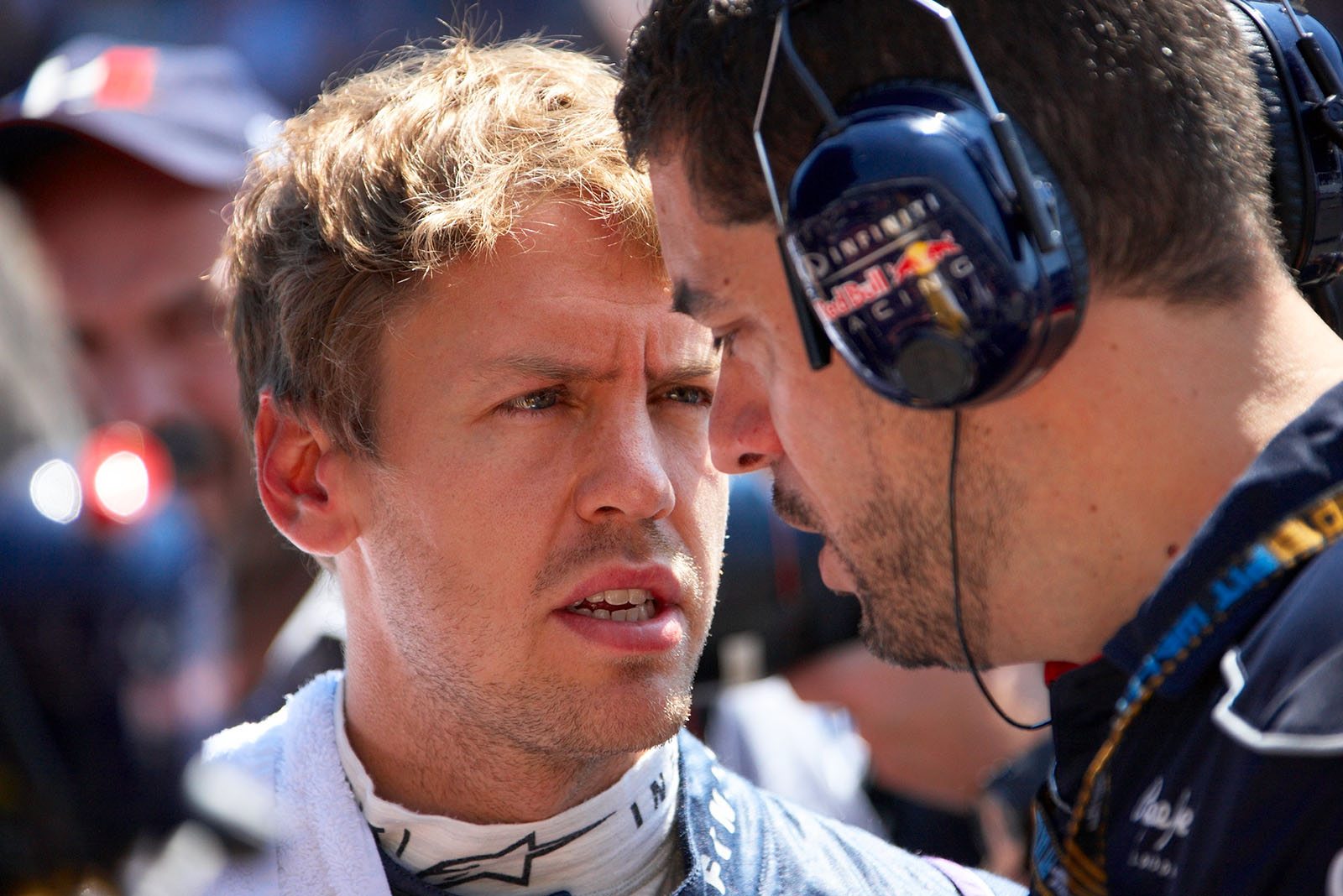 Sebastian Vettel talks to Red Bull Racing race engineer Guillaume Rocquelin at the grid