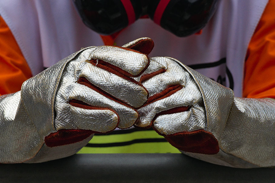 Gloved hands of a firemarshal