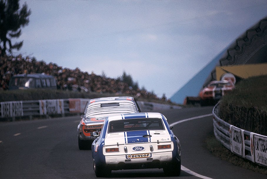 Two Fords race nose-to-tail