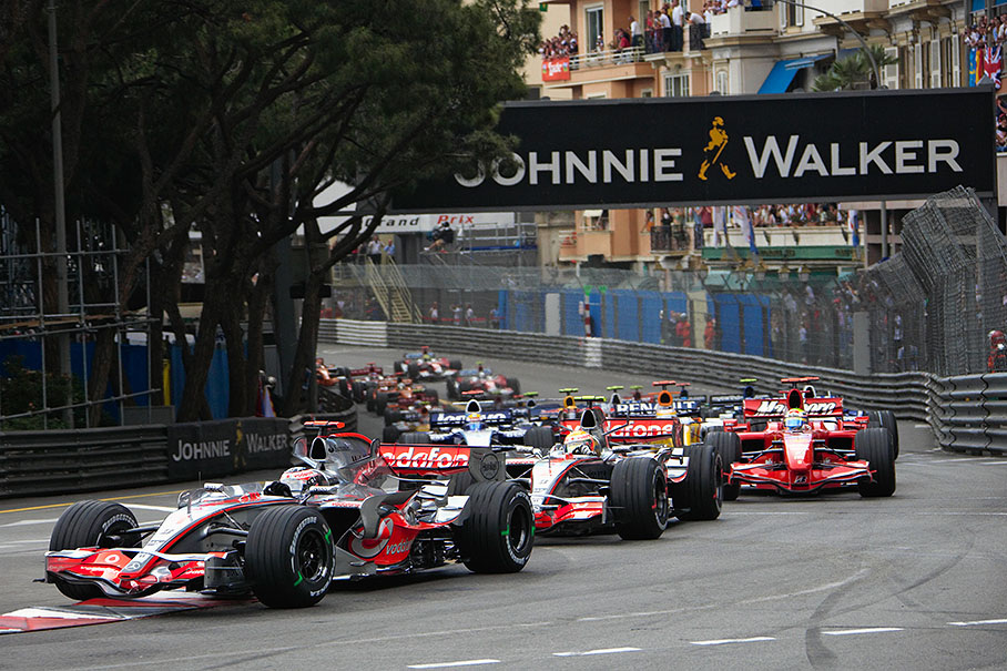 Start field at Ste. Devote, the two McLarens in front, Massa third