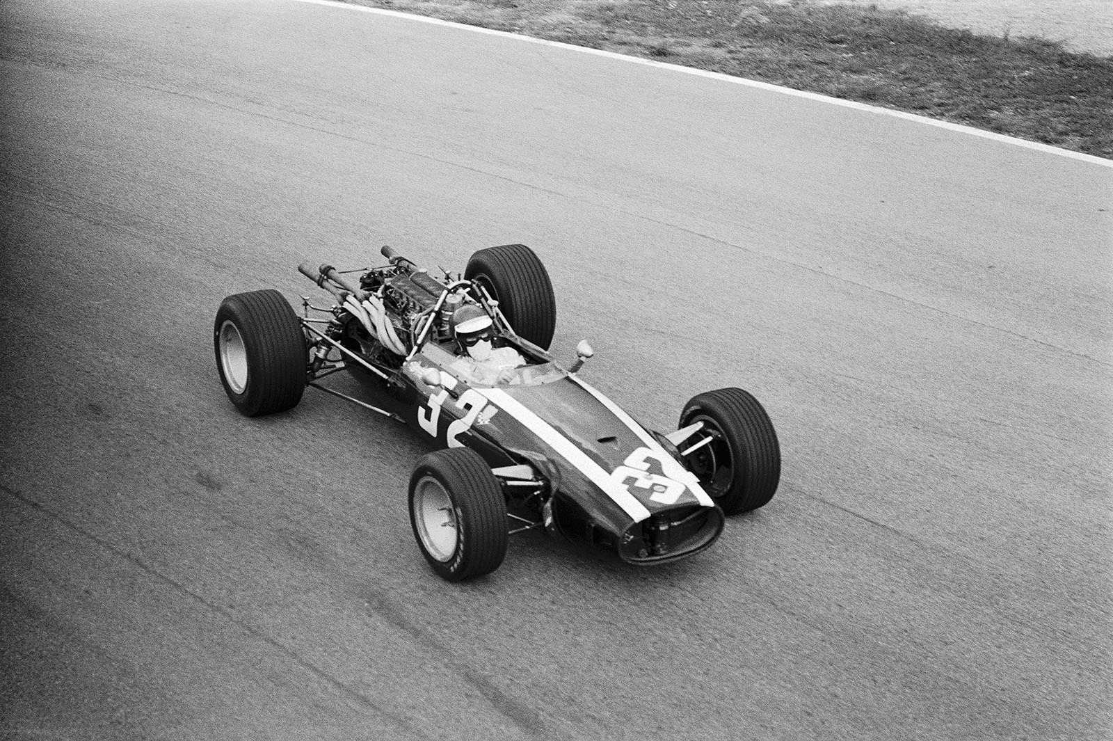 Belgian Jacky Ickx, Cooper-Maserati, drives through the Parabolica, Italian Grand Prix, Monza, 1967