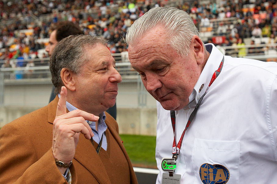 FIA President Jean Todt talks on the gris with temporary FIA steward and F1 World Champion in 1980 Alan Jones