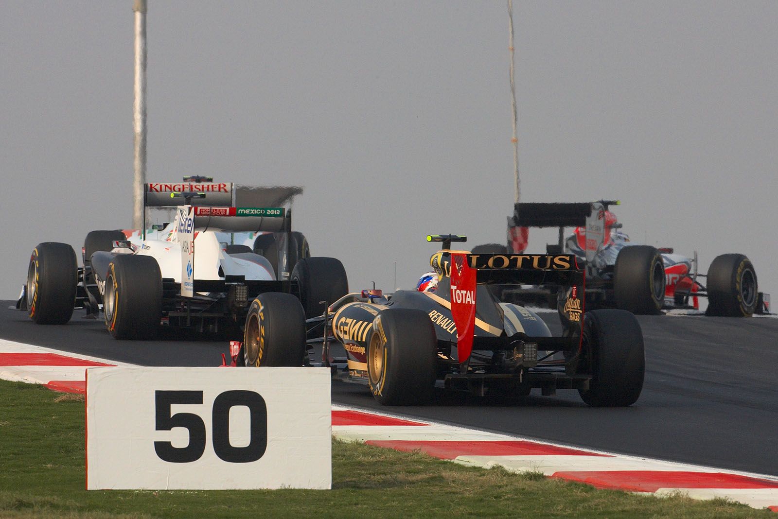 Renault's Vitaly Petrov behind Perez and the pack