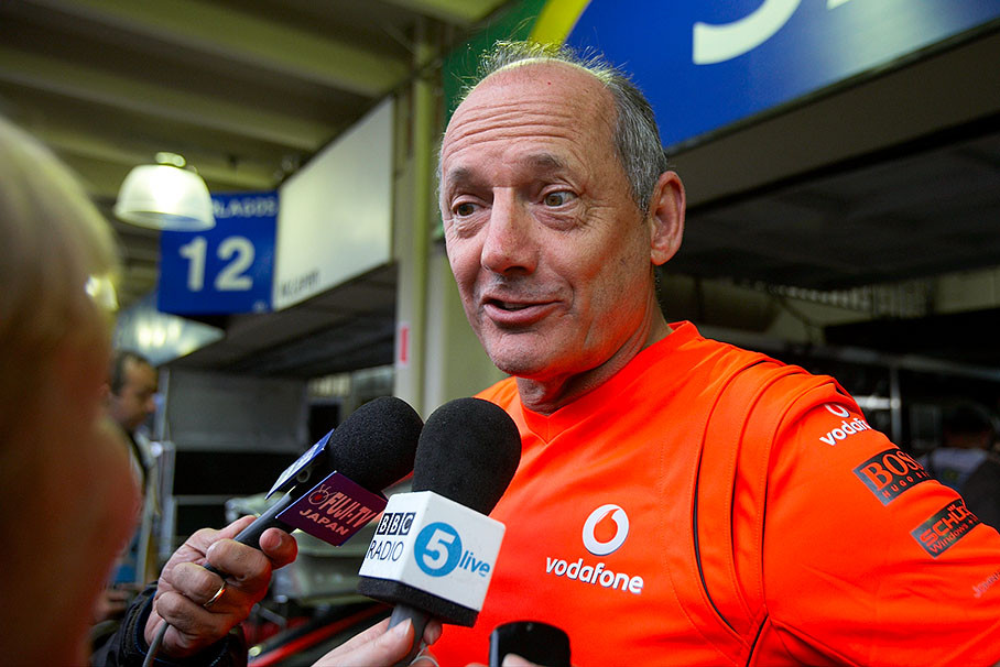 McLaren team principal Ron Dennis gives an interview after the successful race