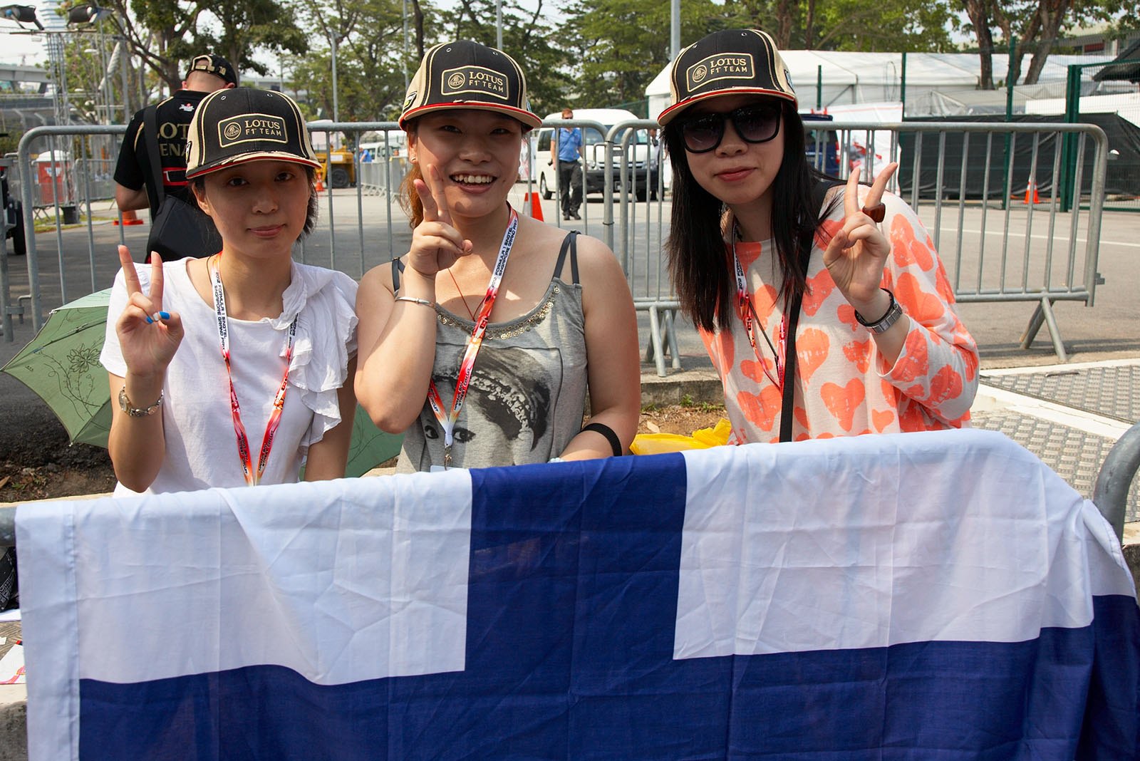 Motivated Raikonnen fans wait in front of the paddock gates