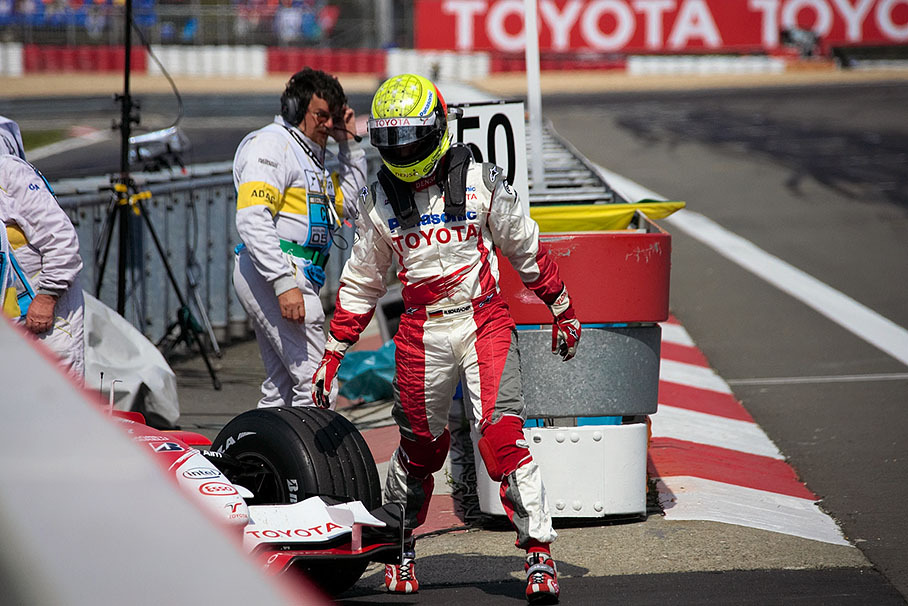Ralf Schumacher leaving his retired car
