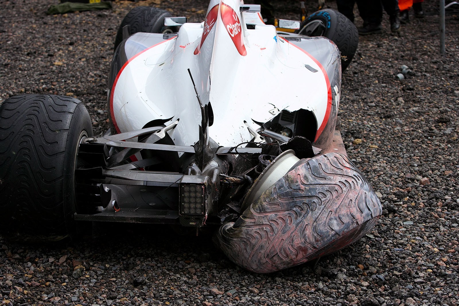 Sauber F1 driver Kamui Kobayashi 's crashed race car after his crash in Friday morning practice