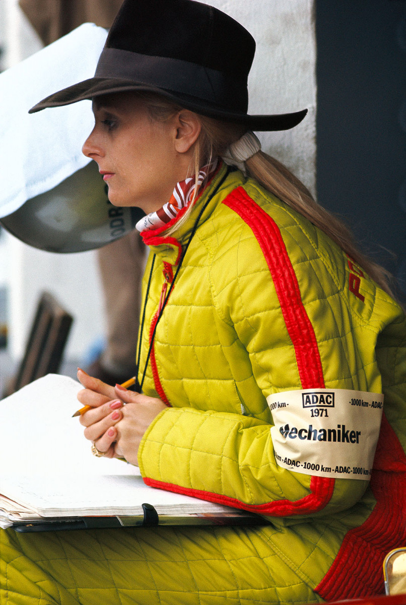 Pedro Rodriguez' english girl friend Glenda notes the lap times