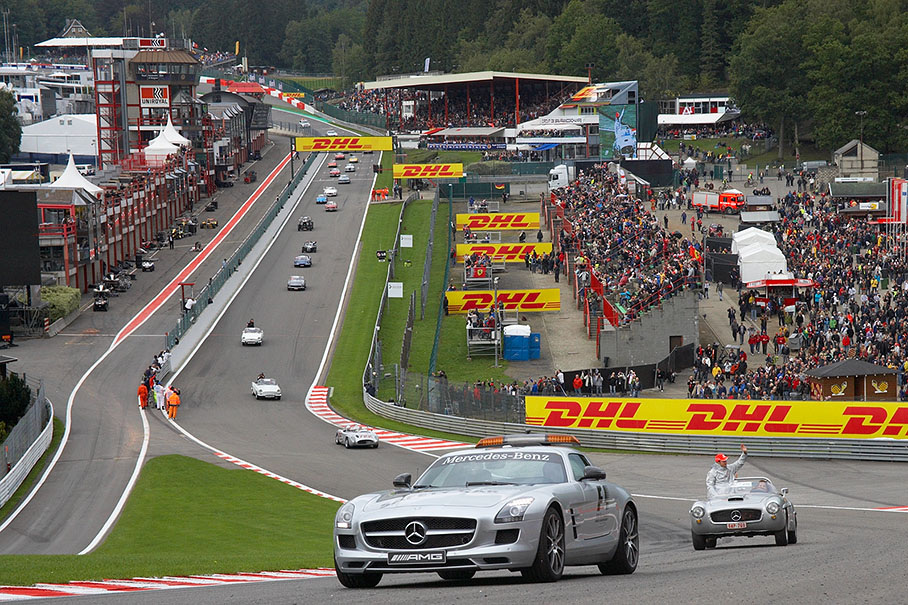 The safety car leads the drivers parade through Eau Rouge