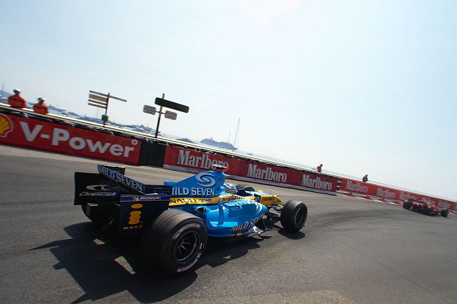 Fernando Alonso behind Felipe Massa at Portier