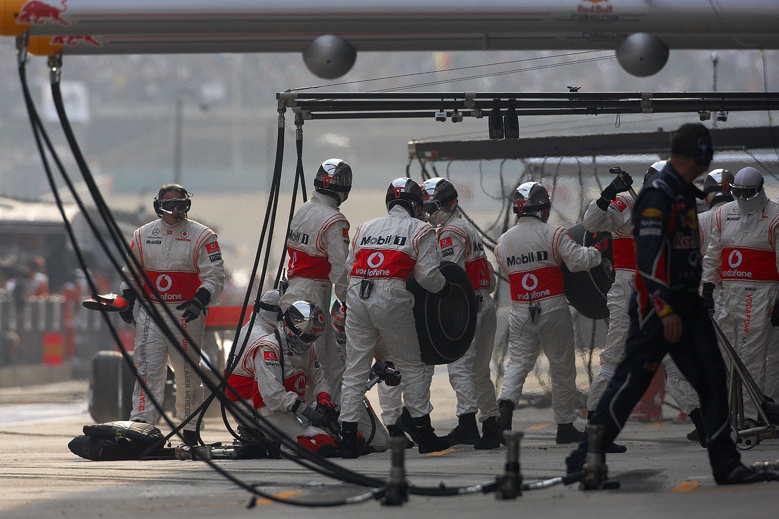 The McLaren pit crew after Lewis Hamilton is gone