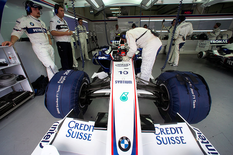 Robert Kubica sits in his BMW Sauber car