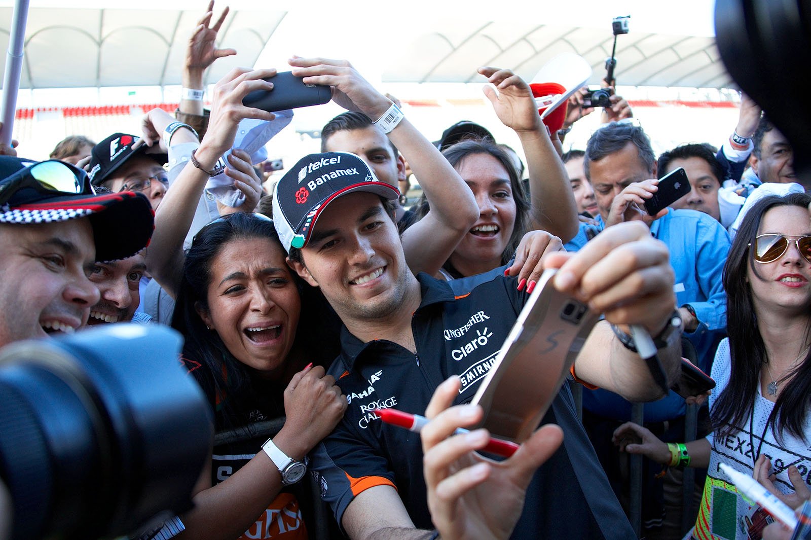 Exuberant joy with local hero, Mexican Force India driver Sergio Perez