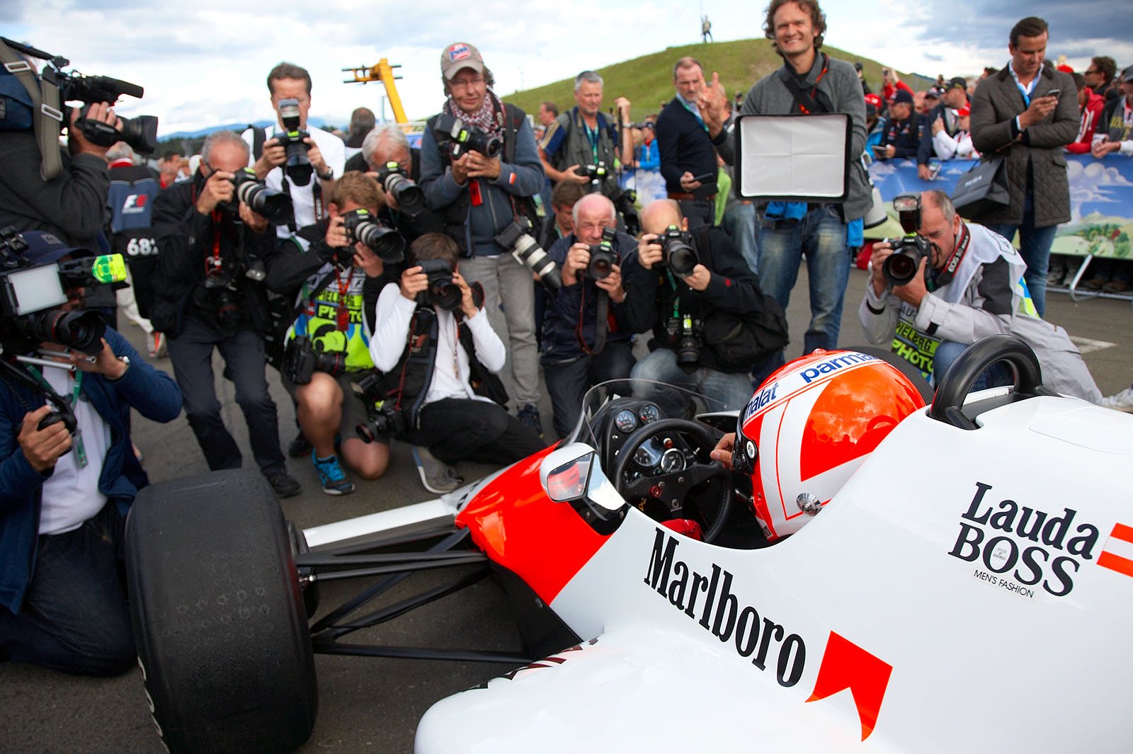 Niki Lauda ready to start for the Legends Parade in his McLaren-TAG Porsche of the 1984 F1 season, Spielberg, Austrian Grand Prix, 2015