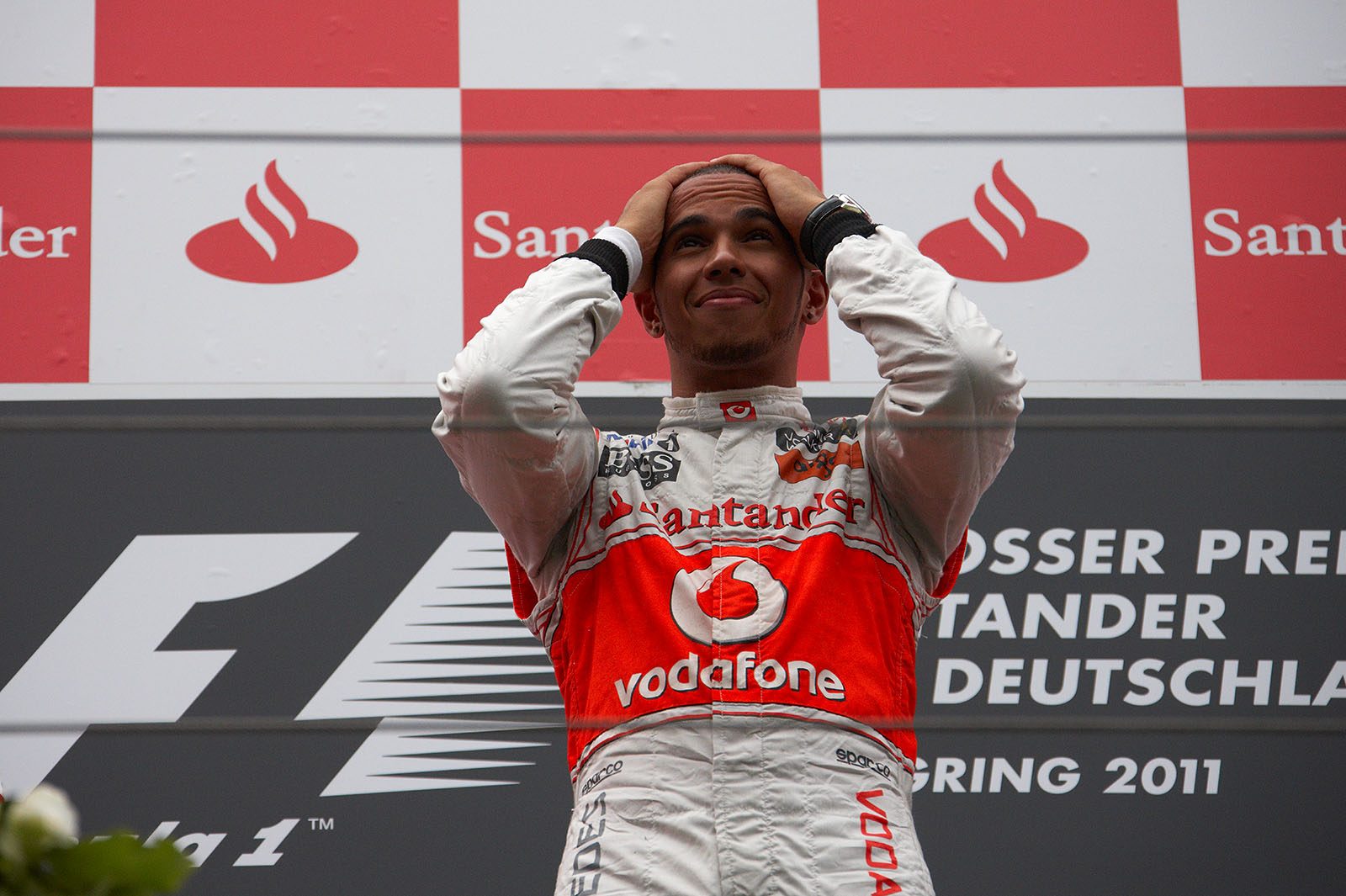 Race winner Lewis Hamilton of McLaren on podium after the German GP