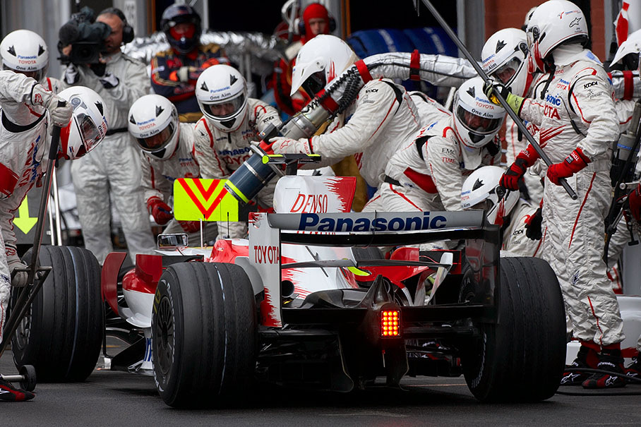 Timo Glock arrives at Toyota pits for service