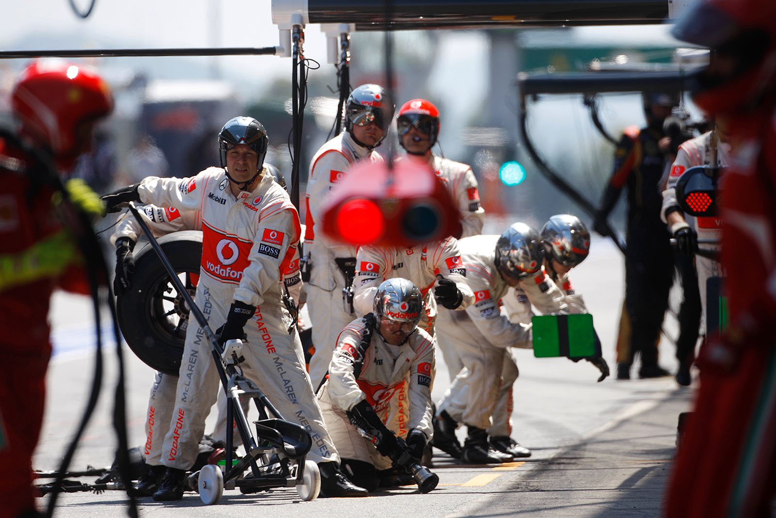 The McLaren crew await their driver