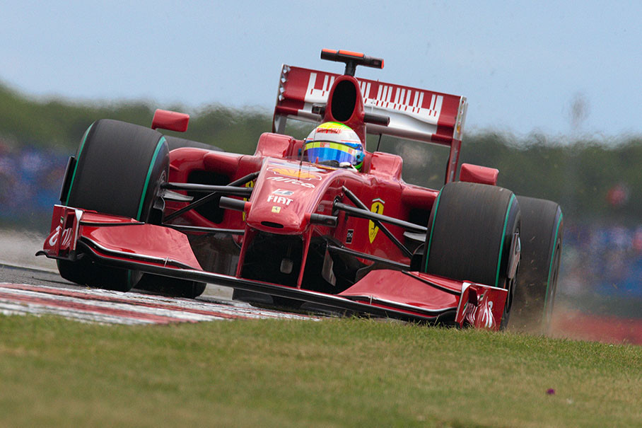 Felipe Massa, Ferrari, runs wide over the curbs