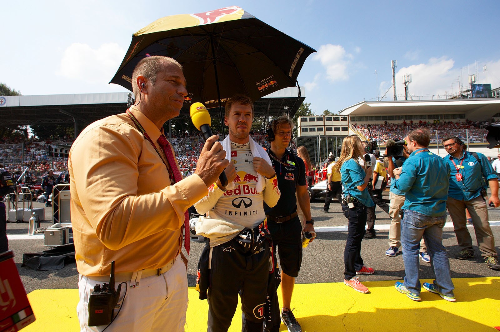 Kai Ebel from RTL Televison, welcomes the German TV audience just ahead of his interview with Sebastian Vettel, Italian Grand Prix, Monza, 2014