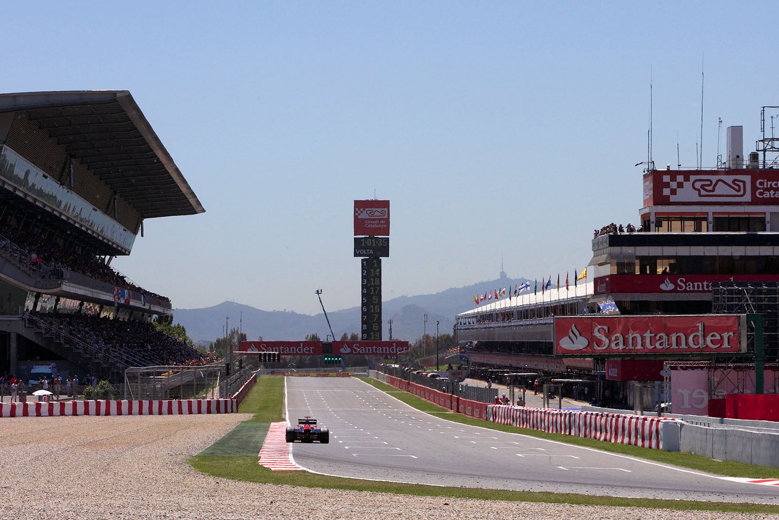 A lonely Marussia Virgin enters the long straight during Friday afternoon practice session