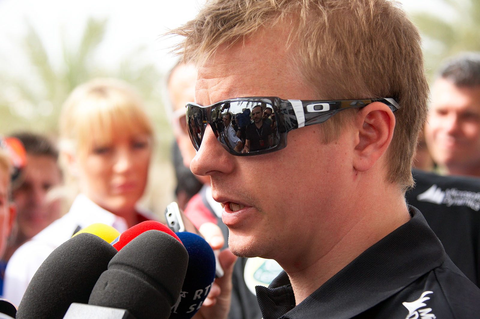Lotus race driver Kimi Raikkonen answers questions of the international media