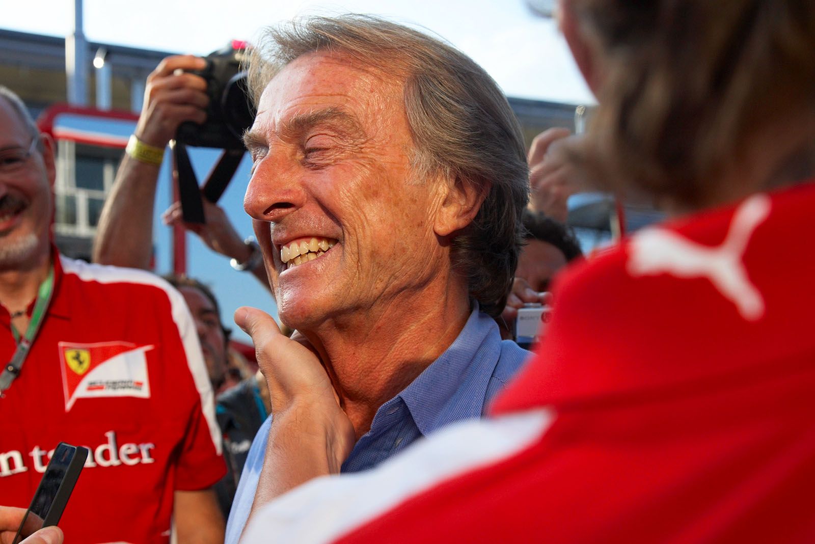 FIAT chairman and Ferrari boss Luca di Montezemolo wasn't happy after an unsatisying qualifying on Saturday afternoon in Monza - and as he sees Alonso coming to the interview place, his mood lights up drastically