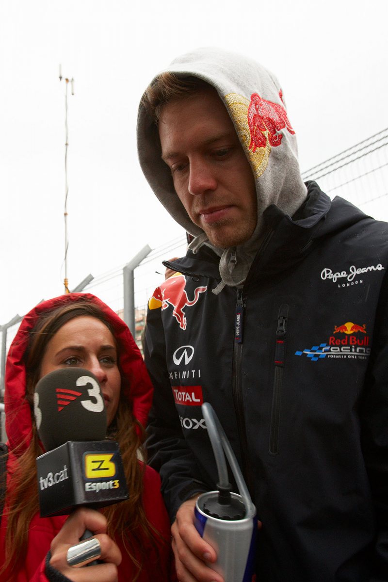 Sebastian Vettel freezes a bit on his way to the drivers parade