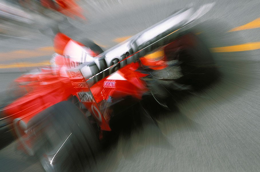Rubens Barrichello zooming away