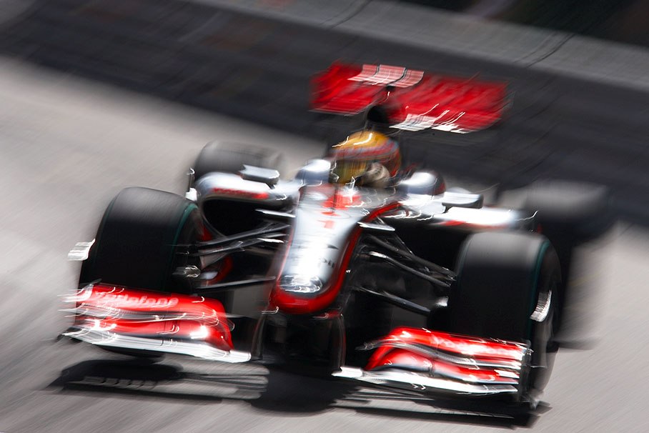 Lewis Hamilton, McLaren Mercedes, lifts a wheel at Mirabeau