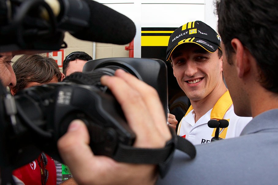 Renault's Robert Kubica talks to the press