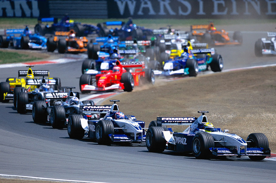 Ralf Schumacher leads the queue, brother Michael Schumacher already went away in to the lead