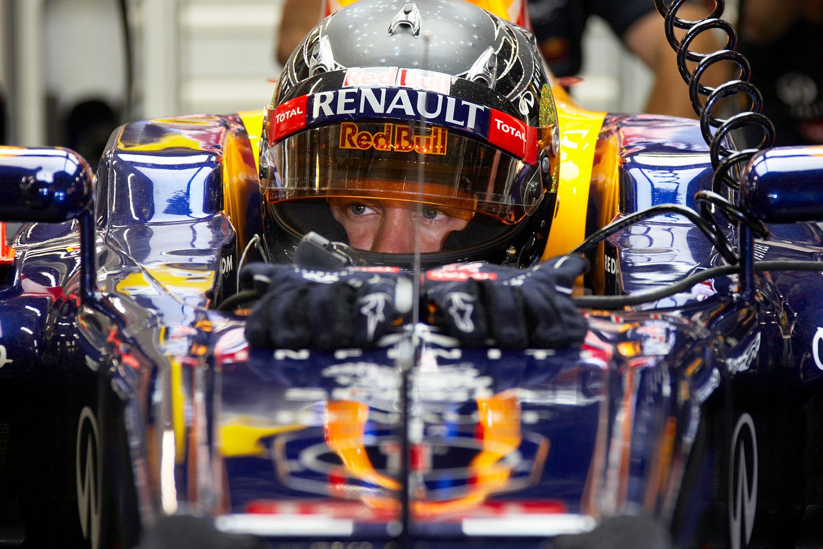 Sebastian Vettel, Red Bull Racing, sits in his race car
