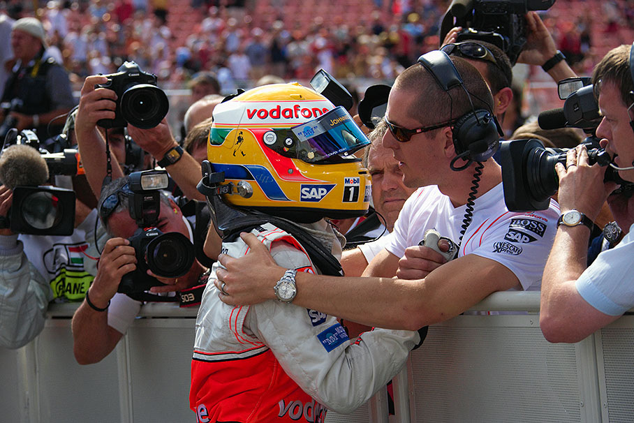 Lewis Hamilton is being hugged by his physio Adam Costanzo after the incident with teammate Alonso during Q3