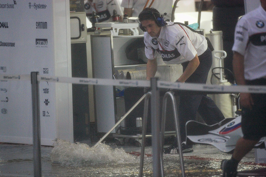 Water flooded garages during a heavy monsoon thunderstorm on Friday morning.