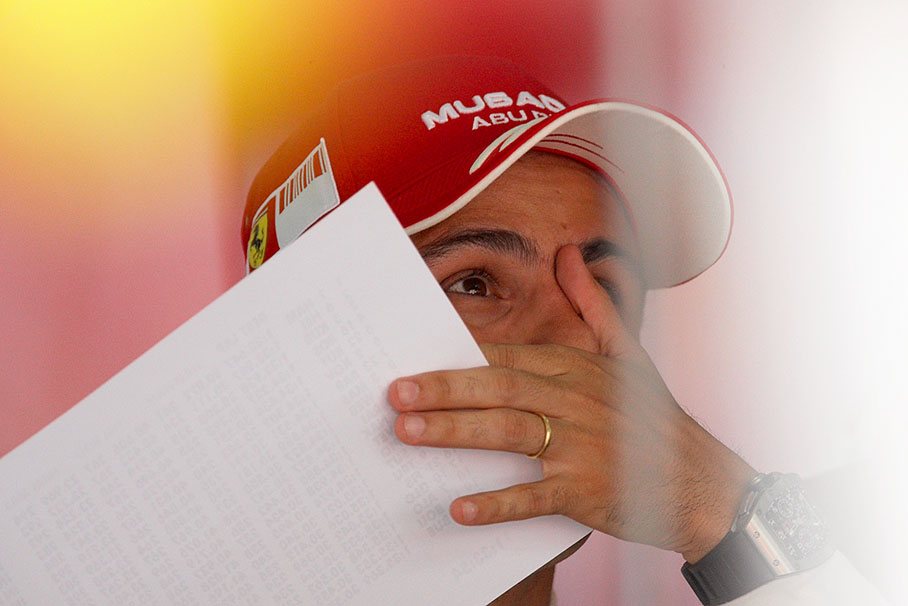 A thoughtful Felipe Massa in Ferrari pits