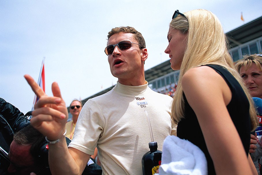 McLaren driver David Coulthard with his girlfriend and model Heidi Wichlinski on the grid