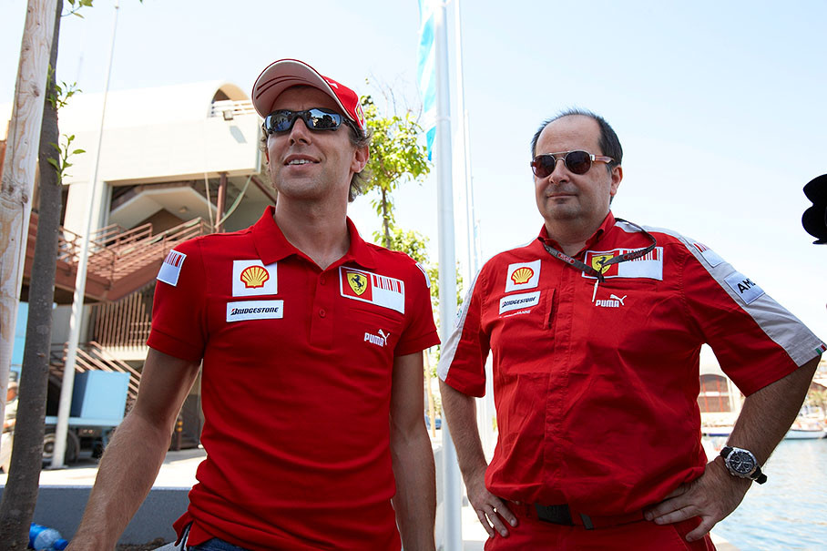 Ferrari test driver and Massa's replacement Luca Badoer faces press with Ferrari's communications director Luca Colajanni