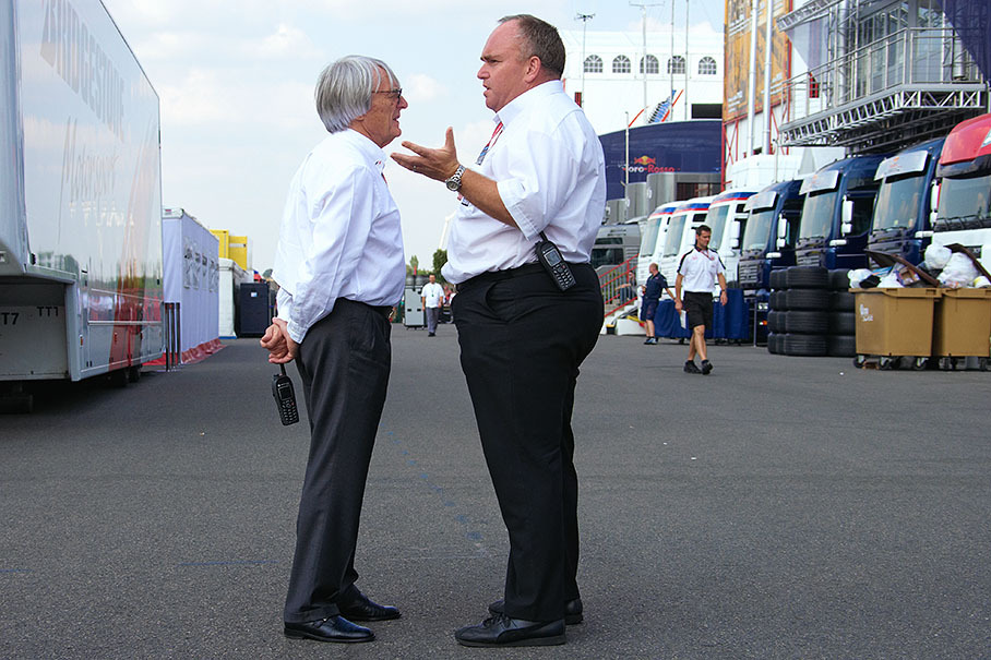 Bernie Ecclestone with Andrew James, an executive of his FOM company