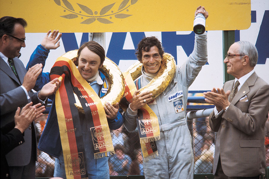 Gerard Larrousse and Vic Elford on podium, after winning the 1000km of Nuerburgring in their Martini-Porsche 908