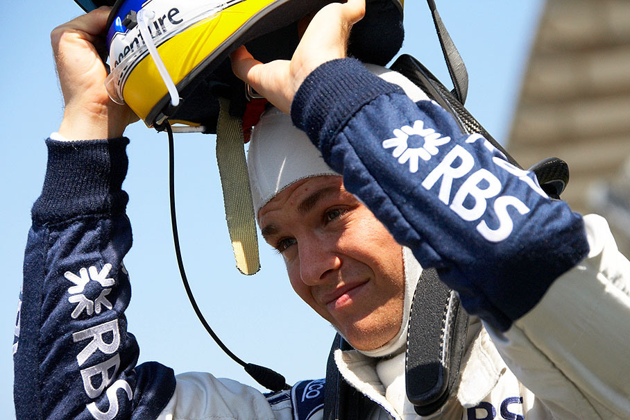 Nico Rosberg puts his helmet on