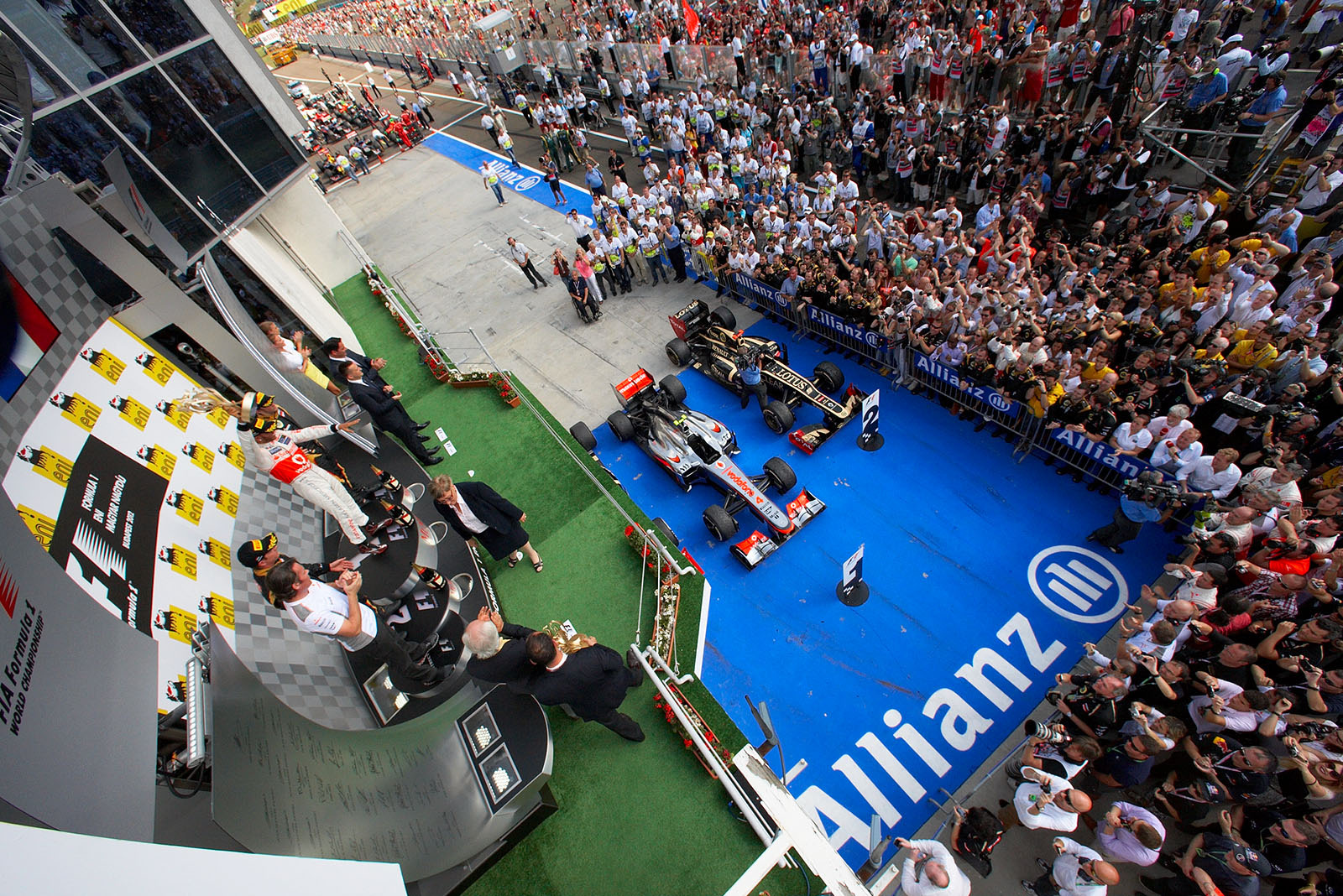 Race winner Lewis Hamilton of McLaren celebrates his achivement on the podium after the Hungarian Grand Prix