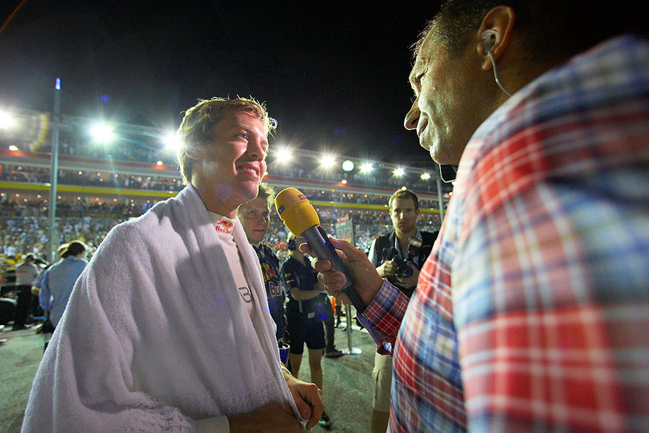 Second grid positioned Sebastian Vettel is being interviewed by RTL TV presenter Kai Ebel