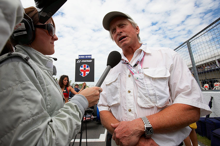 Famous actor Michael Douglas is being interviewed on the grid