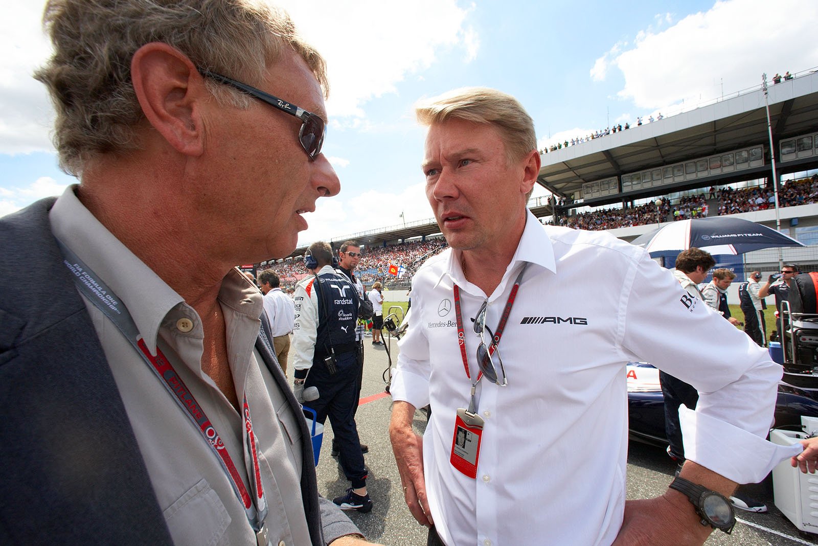 Architect Hermann Tilke chats with former F1 World Champion Mika Hakkinen