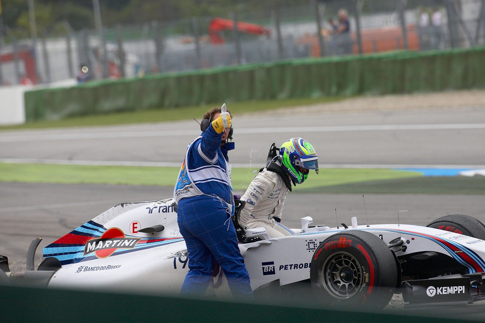 Felipe Massa, Williams, gets away unharmed after the collision with Magussen in the 1st corner, Hockenheim, German Grand Prix, 2014