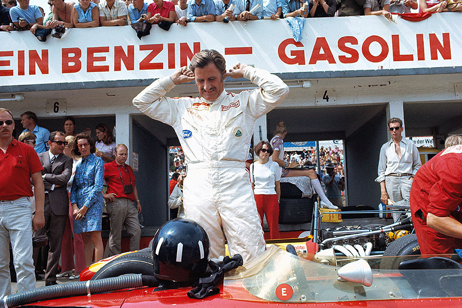Lotus driver Graham Hill prepares himself for the race